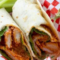 Buffalo Chicken Wrap · Crispy chicken on romaine lettuce, tomato slices, buffalo sauce, and blue cheese dressing in...