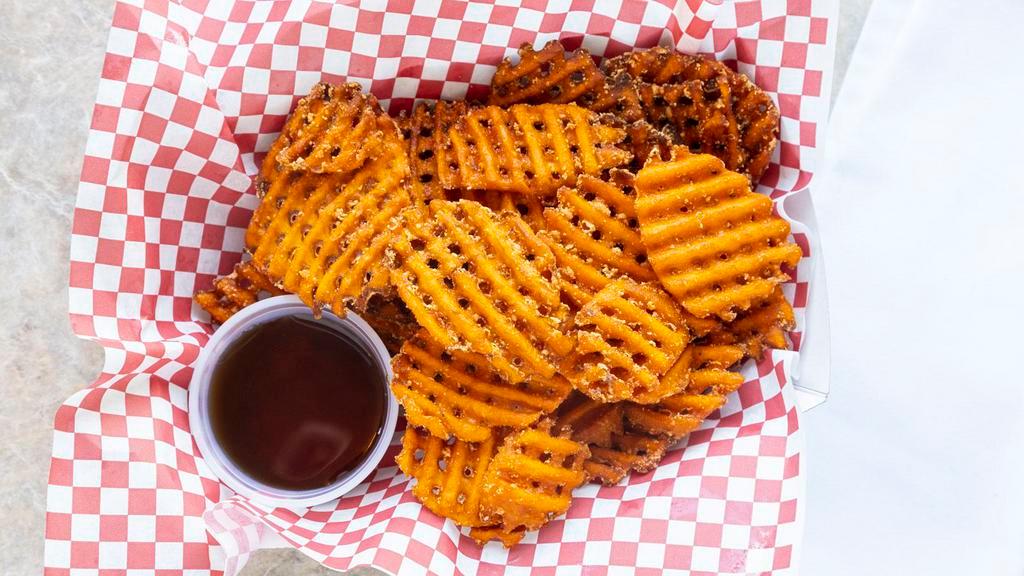 Sweet Potato Waffle Fries · Served with Maple Syrup. Want Ketchup? Let us know.