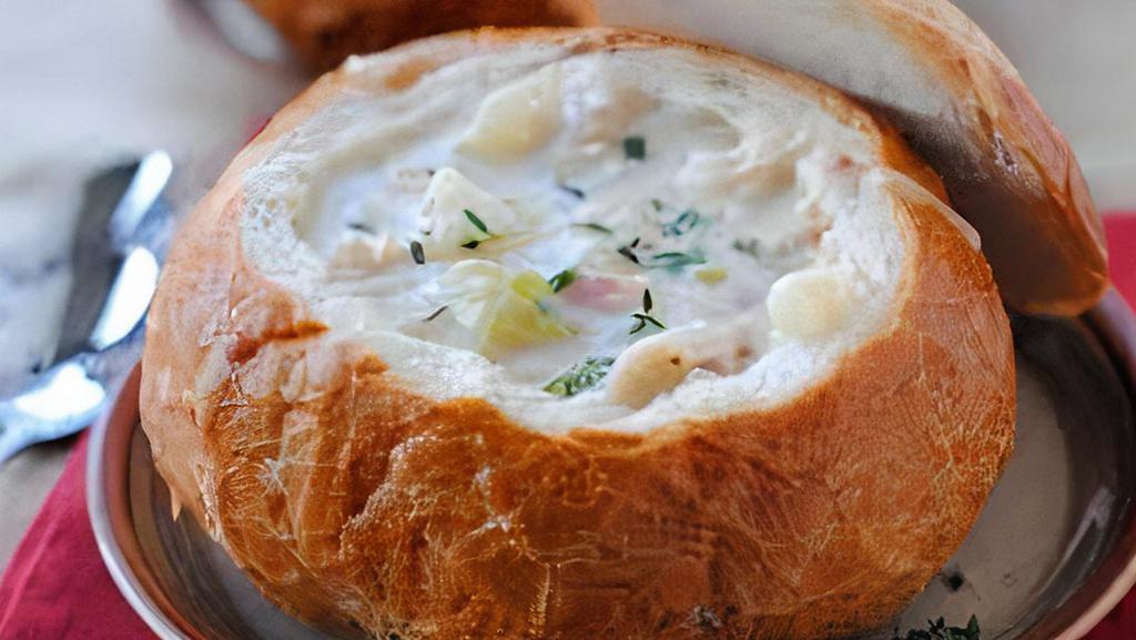 Clam Chowder In A Bread Bowl · New England Clam Chowder accompanied by a Peasant Bread Boule'. Just reheat and pour into the boule'.
