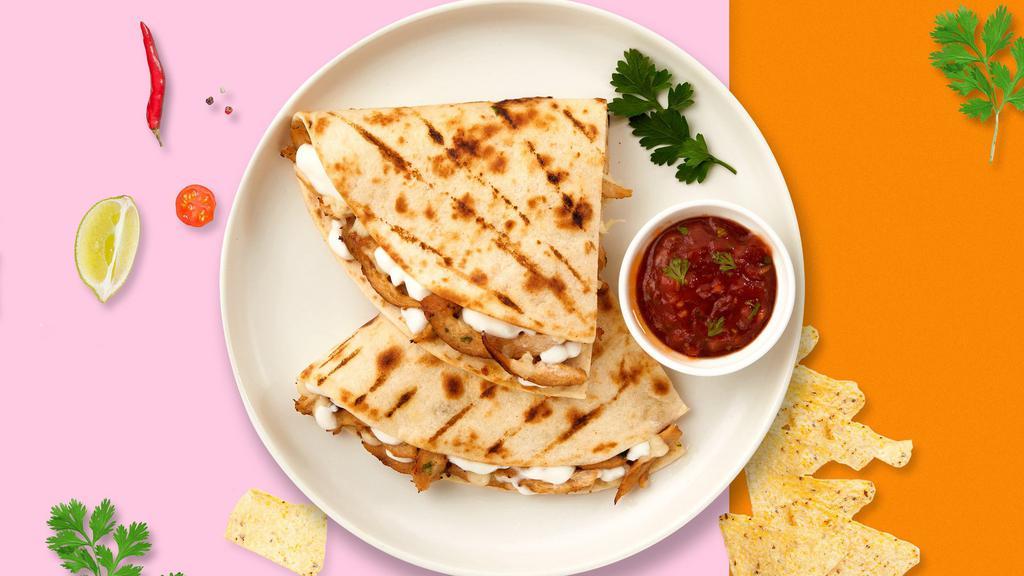Veggie Wedgie Quesadilla · Mixed veggied wrapped with cheese in a grilled tortilla.