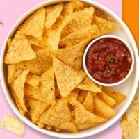 Chips And Salsa · Warm up with toasty tortilla chips served with a side of tangy salsa.