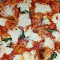 Margarita Pizza · Mozzarella cheese, garlic olive oil, and pesto sauce.