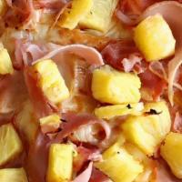 Hawaiian Style Pizza · Made with ham, pineapple, cheese and sauce.