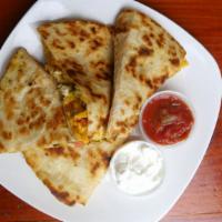 Chicken Quesadilla · Grilled chicken, jalapeños, diced tomatoes, cheese with sour cream and salsa.
