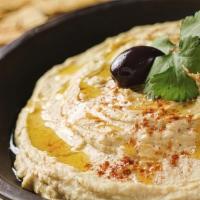 Humus · Hummus. Mashed chickpeas blended with tahini garlic. Appetizers come with a side of pita bre...