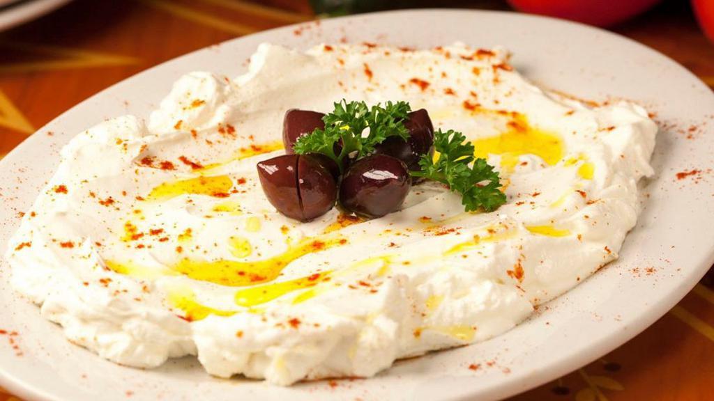 Lebni · Fresh filtered yogurt with walnuts, garlic, and dill. Appetizers come with a side of pita bread.