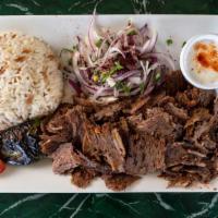 Lamb Gyro · Turkish gyro. Very thinly sliced grilled meat. Served with rice.