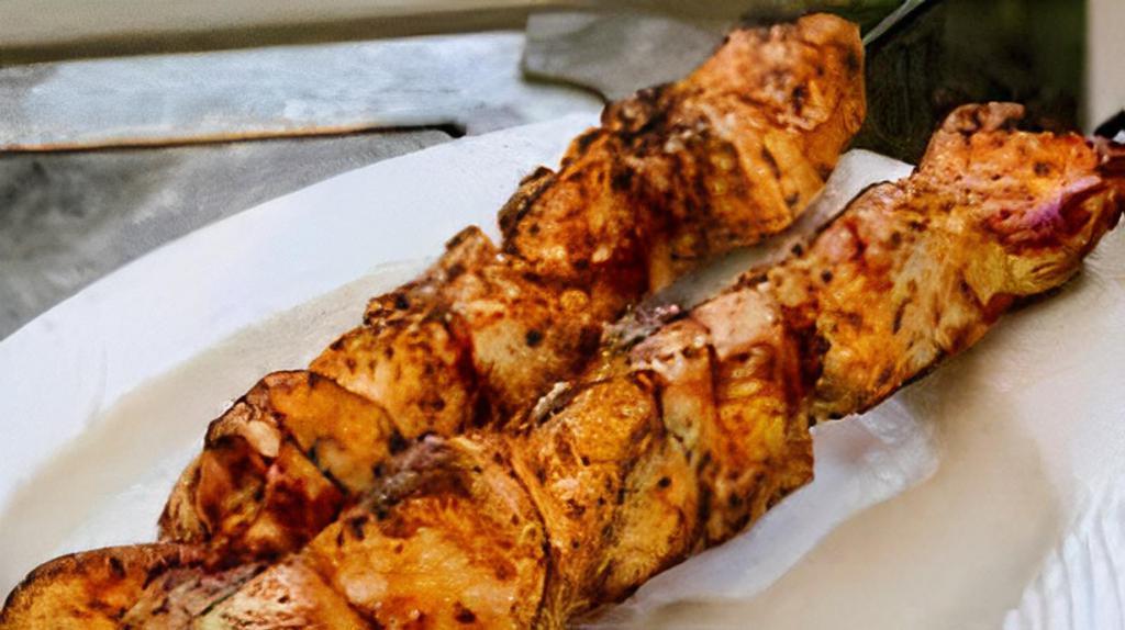 Chicken Shish Kebab · Chicken shish kebab. Char-grilled marinated cubes of chicken breast. Served with rice.