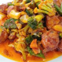 (Ls10) Sweet & Spicy (Chicken/Pork) · Stir Fried mixed vegetables with house special sweet and spicy sauce