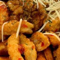 Calamari Basket · fried calamari topped with sweet chili sauce served with fries