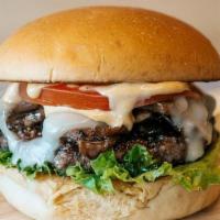 Shroom And Swiss · garlicky sauteed mushrooms, swiss cheese, lettuce, tomato, Swiss Cheese, and our house sauce.