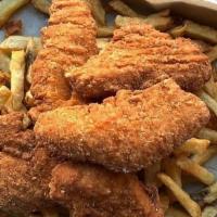 Chicken Tender Basket · Breaded and deep fried chicken tenders with your choice of fries or onion rings!