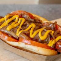 Loaded Dog · All beef hot dog topped with sautéed onions, tomato, mustard, relish & celery salt