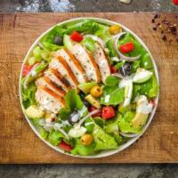 Grilled Chicken Over Greek Salad · Grilled chicken, romaine lettuce, cucumbers, tomatoes, red onions, olives, and feta cheese t...