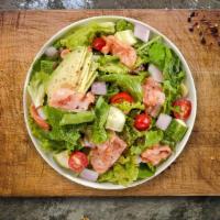 Greekin' Tuna Salad · Romaine lettuce, tuna, cucumbers, tomatoes, red onions, olives, and feta cheese tossed with ...