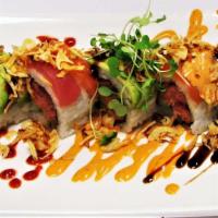 Firecracker Roll* · spicy tuna, salmon, tempura shrimp, avocado, 
*Served raw or undercooked, or contains (or ma...