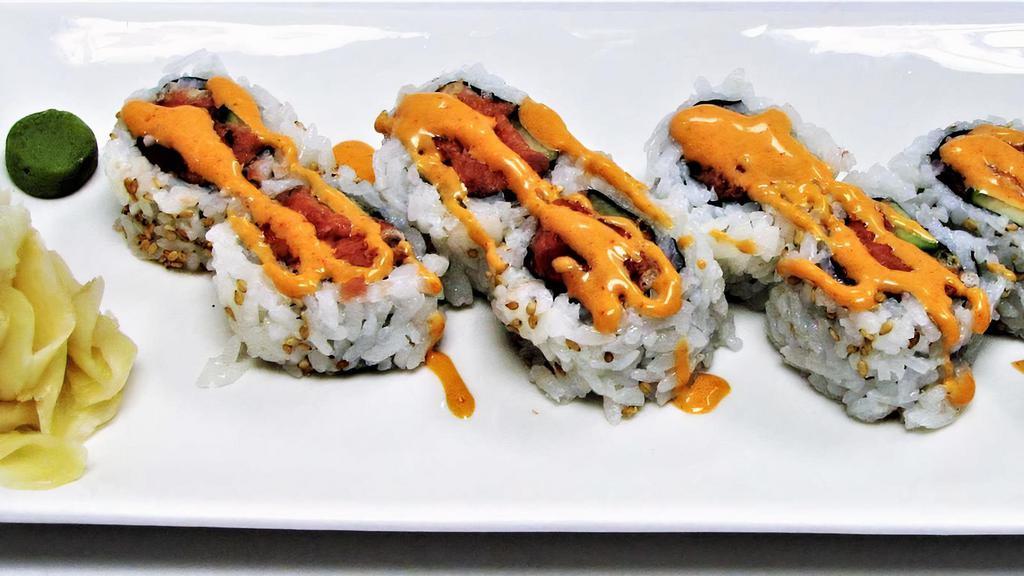 Spicy Tuna Roll* · cucumber, spicy mayo,
*Served raw or undercooked, or contains (or may contain) raw or undercooked ingredients. Consuming raw or undercooked meats, poultry, seafood, shellfish, or eggs may increase your risk of foodborne illness, especially if you have certain medical conditions.