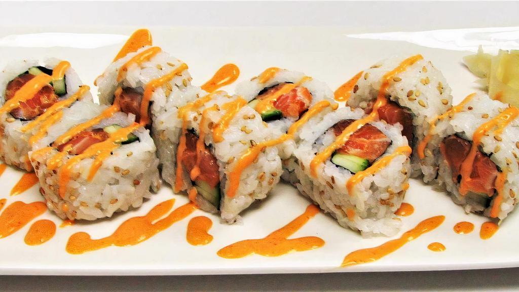 Spicy Salmon Roll* · cucumber, spicy mayo,
*Served raw or undercooked, or contains (or may contain) raw or undercooked ingredients. Consuming raw or undercooked meats, poultry, seafood, shellfish, or eggs may increase your risk of foodborne illness, especially if you have certain medical conditions.