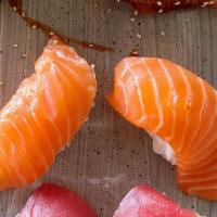 Sake Nigiri* · salmon, 2 pieces per order,
*Served raw or undercooked, or contains (or may contain) raw or ...