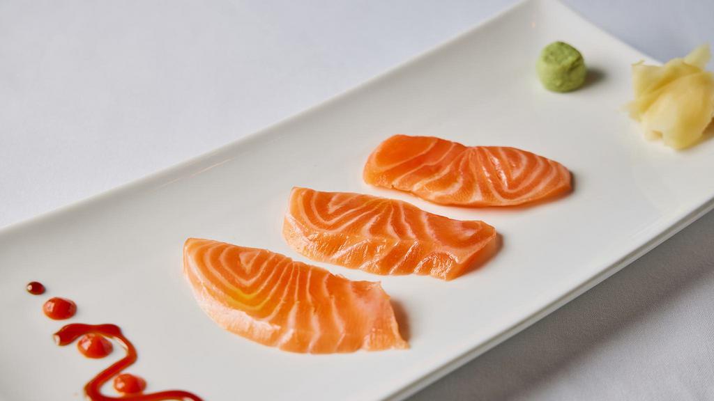 Sake Sashimi* · salmon, 3 pieces per order, 
*Served raw or undercooked, or contains (or may contain) raw or undercooked ingredients. Consuming raw or undercooked meats, poultry, seafood, shellfish, or eggs may increase your risk of foodborne illness, especially if you have certain medical conditions.