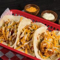 3 Tacos · Soft or Hard Taco, Ground Beef or Chicken, Sour Cream, Lettuce, Tomatoes, Salsa & Cheese.