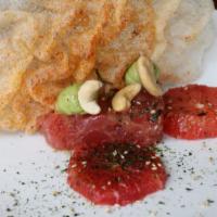 Tuna Tartare · Avocado, cucumber, black garlic, crispy vermicelli