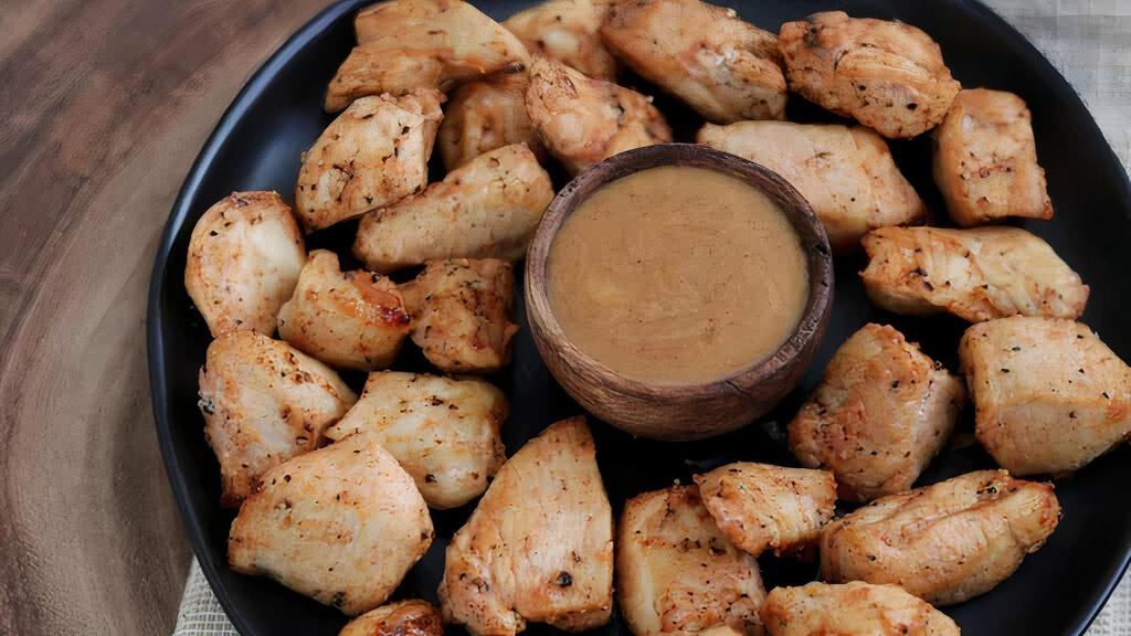 Mike’S Famous Dipping Grilled Chicken Bites · All white meat chicken, grilled, & served with choice of dipping sauce.