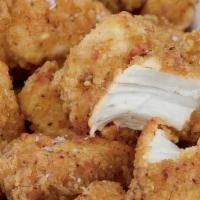Mike’S Famous Crispy Dippin' Chicken Bites · All white meat chicken lightly coated, deep fried, & served with choice of dipping sauce.