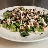 Blt Salad · Romaine, crumbled bacon, diced tomatoes, with blue cheese dressing.