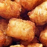 Tater Tots · Tater tots lightly seasoned and fried golden brown!