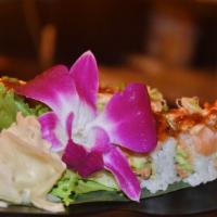 Crazy Salmon Roll · Spicy tuna/crunch/avocado inside topped w. seared salmon and baked with mayo.