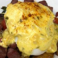 Corned Beef Hash · Onion, red pepper, brussels sprouts, poached egg, russet potatoes, béarnaise.