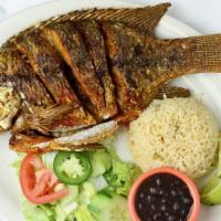 Tilapia Frita · Fried tilapia. Served with rice, beans, and salad.