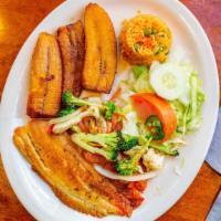 Filete A La Plancha · Grilled fish. Served with rice, plantains, and sautéed vegetables.