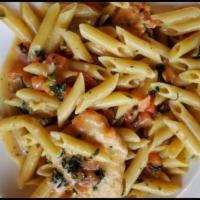 Penne Gaetano · Sauteed chicken, fresh tomatoes, basil and Romano cheese tossed with penne.