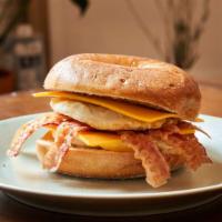 Gold B.E.C · Double eggs, extra bacon, double cheddar cheese, sriracha mayo on a bagel.