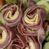 Antipasto · Fresh lettuce, tomato, onions, mushrooms roasted peppers, cucumbers, capicola ham, salami, p...