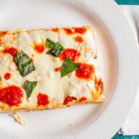 Grandma Margherita Slice · Mozzarella cheese, crushed tomato, fresh garlic Parmesan cheese, fresh basil.