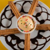 Churros · Five pieces of traditional Mexican doughnuts. Served with chocolate and strawberry sauce.
