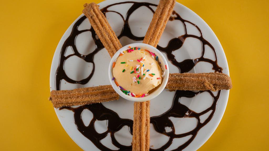Churros · Five pieces of traditional Mexican doughnuts. Served with chocolate and strawberry sauce.