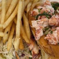 Brown Butter Lobster Roll · Warmed in brown butter with fries and coleslaw.