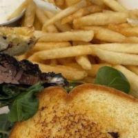 Smoked Brisket Sandwich · On Texas toast with horseradish aioli and watercress, fries, and coleslaw.