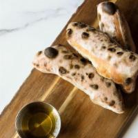 Neapolitan Breadsticks · served with Frantoia extra virgin olive oil
