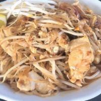 Pad Thai · Stir Fried rice noodles, egg, bean curd, red onions, radish, scallions, bean sprouts, tamari...