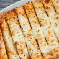 Cheesy Breadsticks · Our breadsticks topped with a blend of melted cheeses, oregano, garlic and butter, served wi...