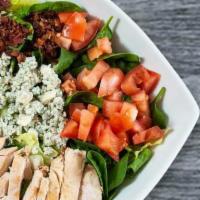 Cobb Salad · Bacon grilled chicken hard-boiled egg tomatoes gorgonzola and mixed greens.