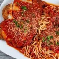 Chicken Parmigiana · Served with spaghetti marinara sauce and sprinkle parmesan cheese on top.