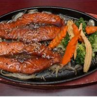 Salmon Teriyaki · Salmon marinated on a hot sizzling plate, served with in-season vegetables. Comes with miso ...