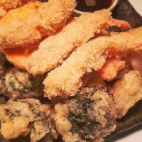 Shrimp And Vegetable Tempura · Shrimp and in-season vegetable deep fried in tempura batter. Comes with miso soup or house g...