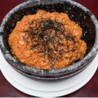 Spicy Salmon Rice · Spicy salmon tartare, shiitake mushrooms, over furikake rice, served on a hot stone bowl